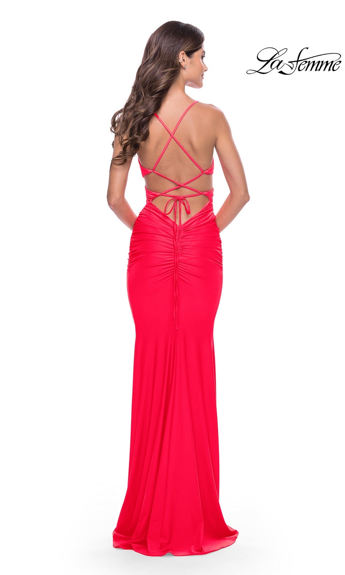 Back view of the Long Prom Dress: La Femme 31442, a floor-length red gown featuring a strappy open back and ruched detailing.